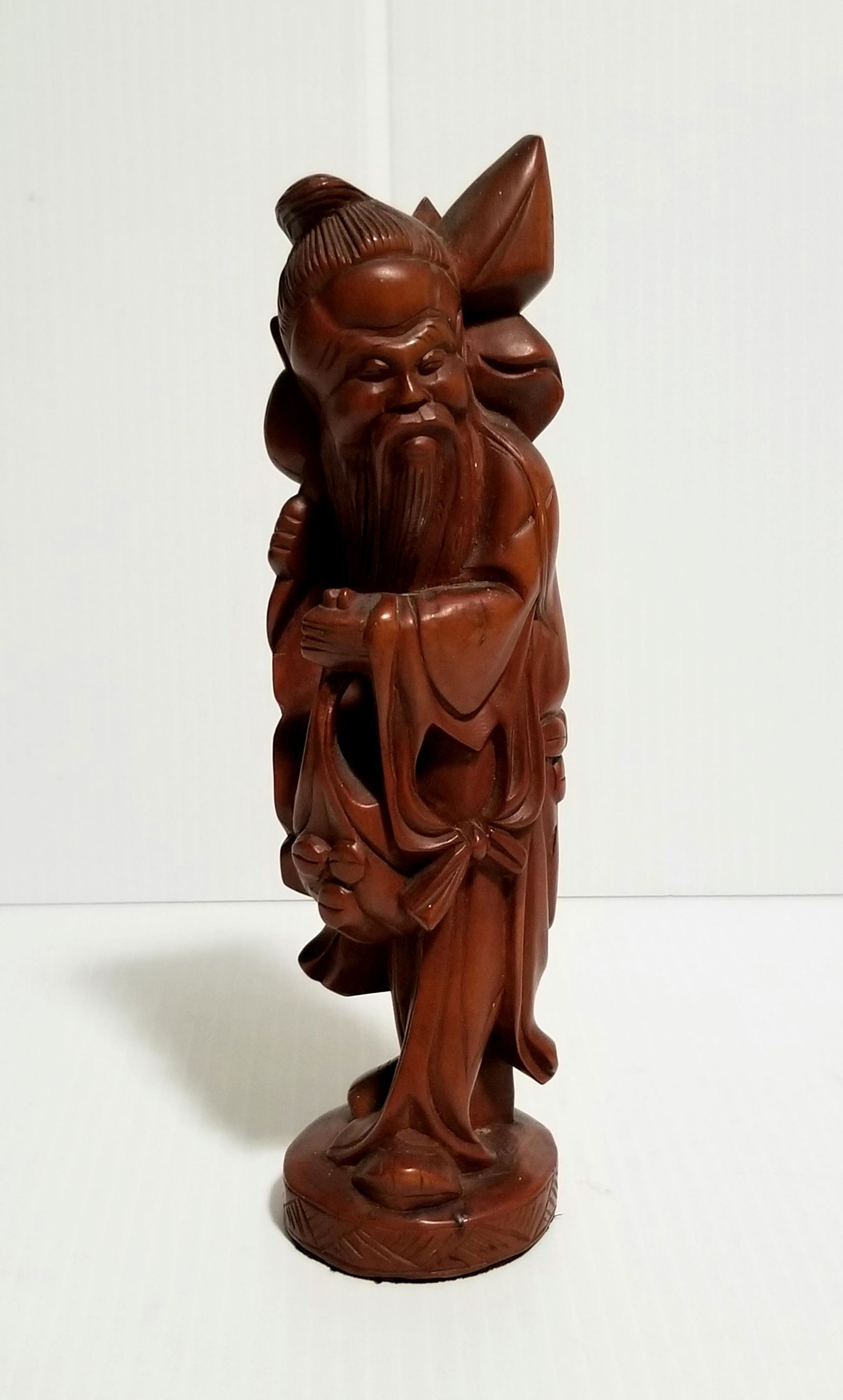 Beautiful Hand Carved Asian Wood Sculpture: Nice hand carved old man Asian in wood sculpture, 8 x 2 1/2 inches