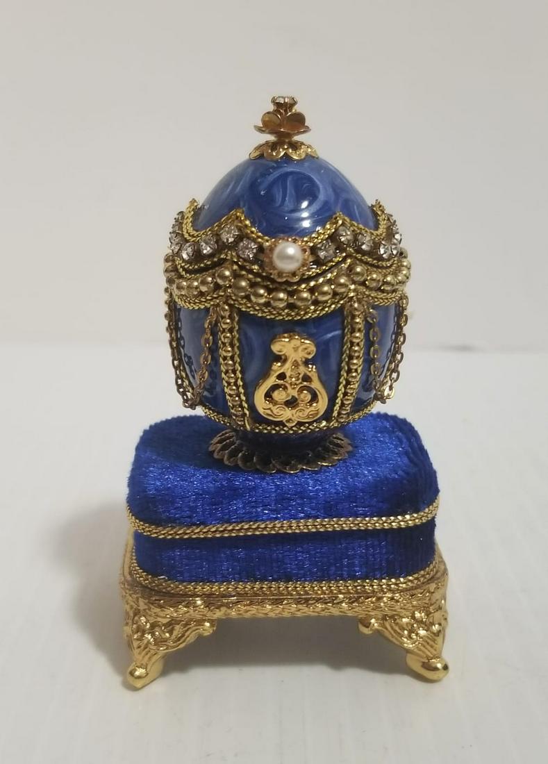 Nice Jewelry Enamel Egg Music Box: Beautiful blue enamel, blue velvet musical box, excellent details with original box, 3 1/4 x 2 x 1 1/2 inches