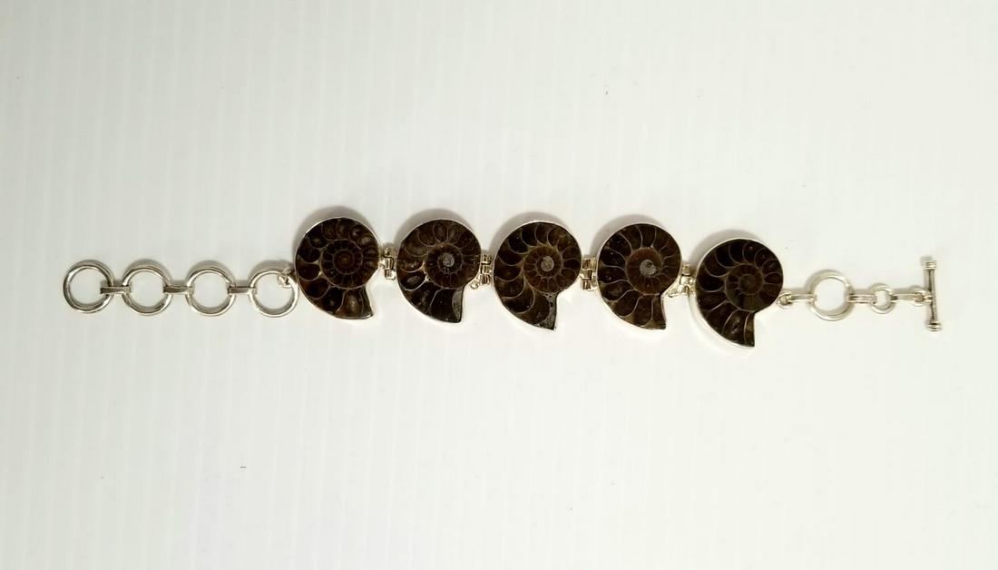 Nice 925 Silver Ammonite Bracelet: Nice 925 sterling silver 5 ammonite nautilus shell, 1 7/8 x 1 3/4 inches, bracelet 7 3/4 inches long