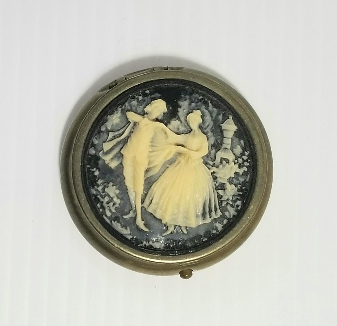 Nice Romantic Metal Trinket Box: Nice romantic metal trinket box, Hong Kong, 2 inches round diameter