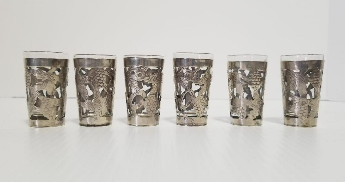Vintage 925 Mexican Floral Carved Oven Shot Glasses: Nice vintage 6 Mexican 925 sterling silver, sleeves over glass cordial shot glasses, 2 x 1 inches, very nice with floral pattern, mark on the bottom