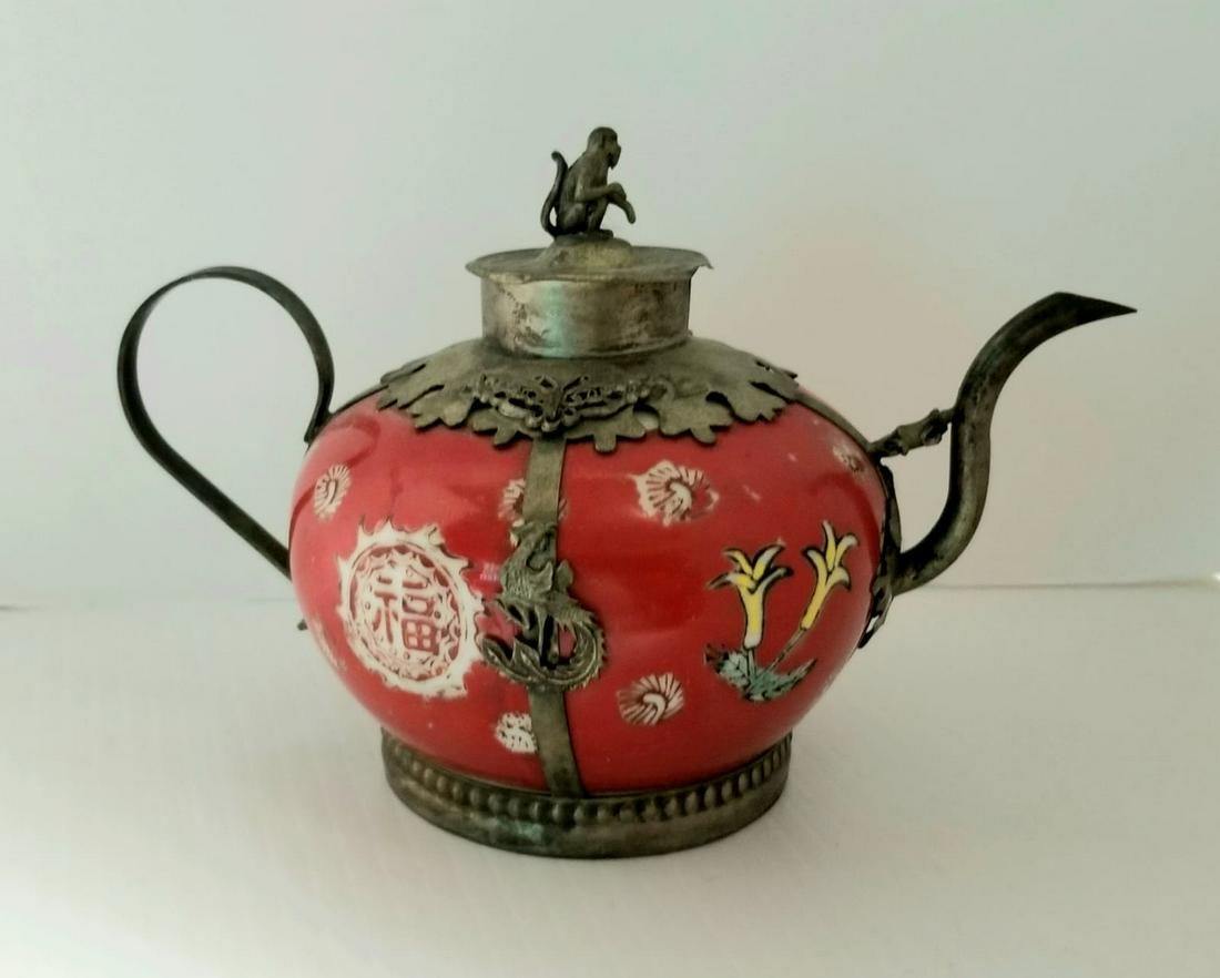 Nice Chinese Red and Silver Porcelain Tea Pot: Nice Chinese porcelain tea pot, Monkey in the cap, metal silver, excellent details, 6 1/4 x 4 1/2 x 3 3/4 inches.