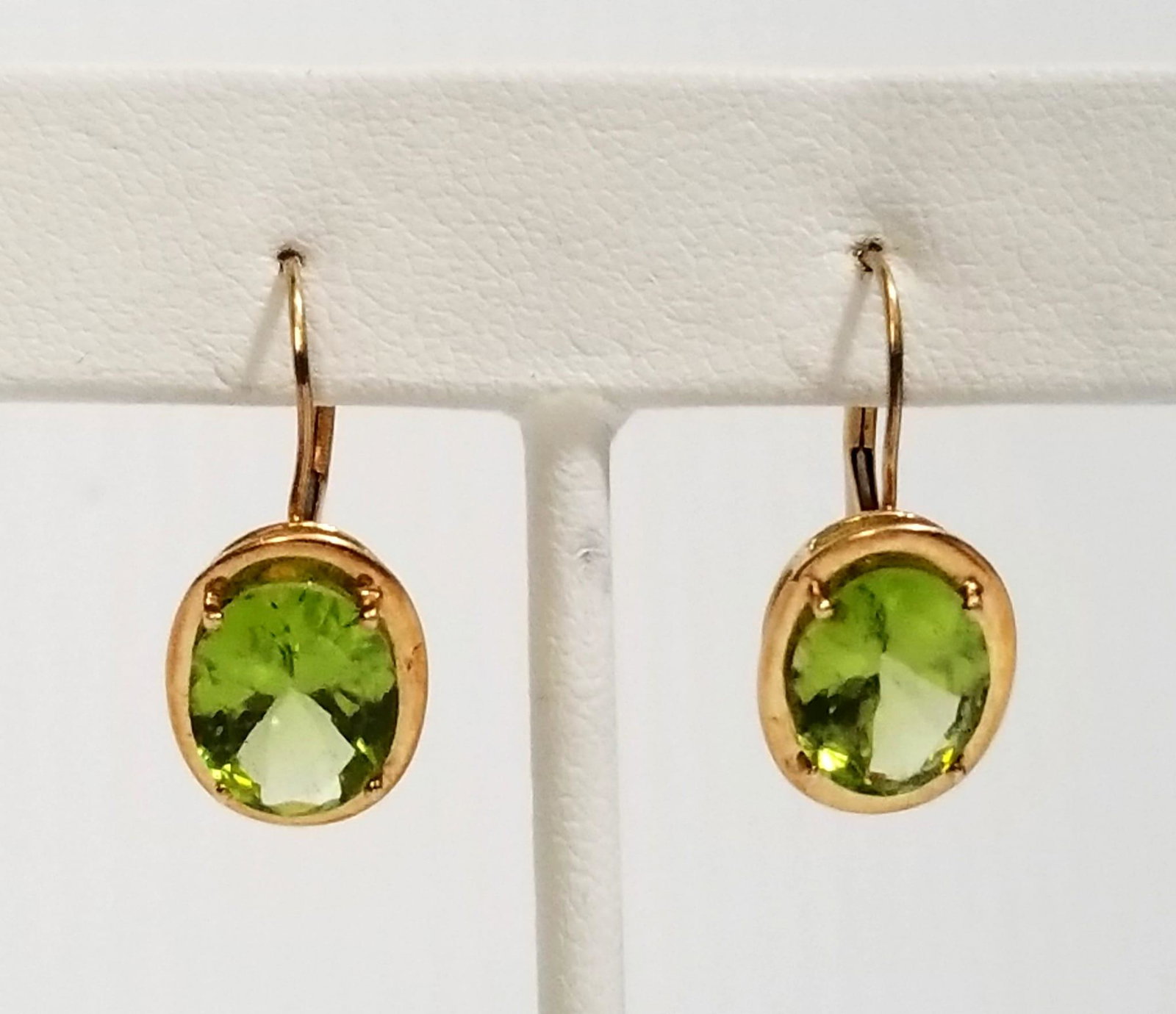 Elegant JCM 14KT Peridot Earrings: Amazing JCM 14kt yellow gold, 12 CT green peridot stone earrings, 7/8 x 3/8 inches, 2.9 grams, 1.9 dwt