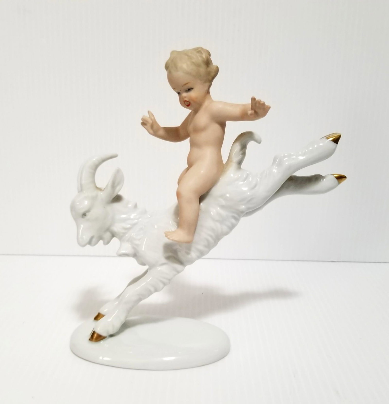 Beautiful Boy & Goat Porcelain Figurine: Nice boy and goat porcelain figurine, Germany, 7 5/8 x 7 x 2 5/8 inches