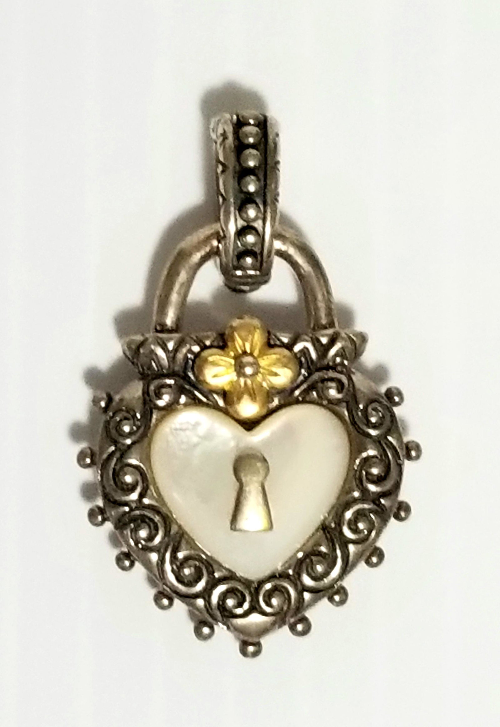 Amazing 925 18KT Bixby Heart Pendant: Nice 925 sterling silver, 18kt gold, Bixby heart pendant, 1 3/8 x 7/8 icnhes, 10.4 grams.