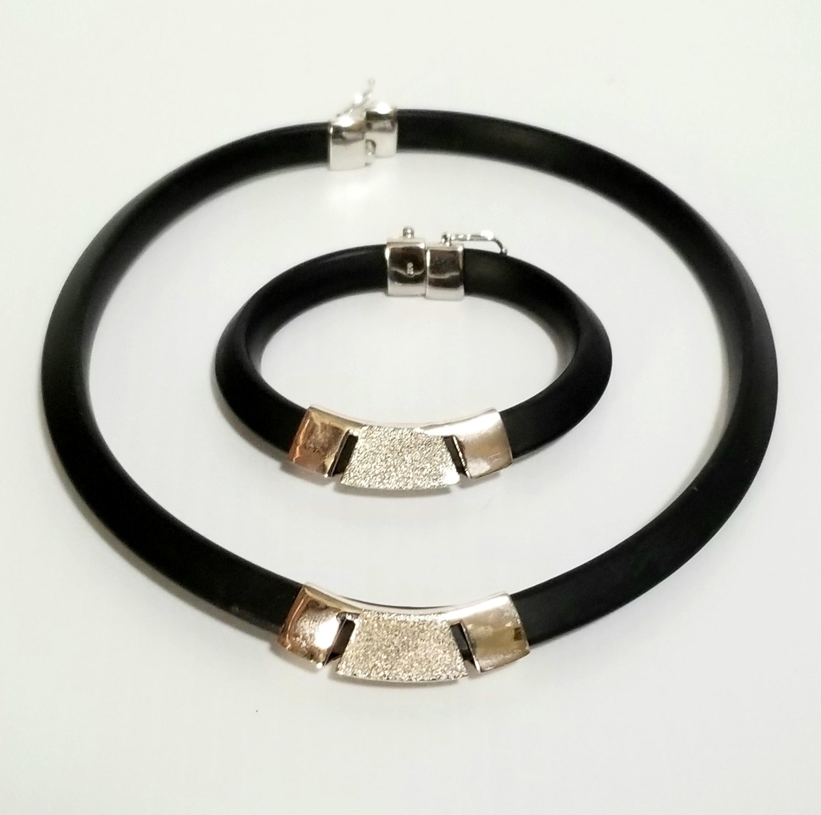 Amazing 925 Black Rubber Choker Set: Beautiful 925 sterling silver black rubber choker neacklace and bracelet set, necklace 15.5 inches long x 9 mm, bracelet 7 inches long x 9 mm.