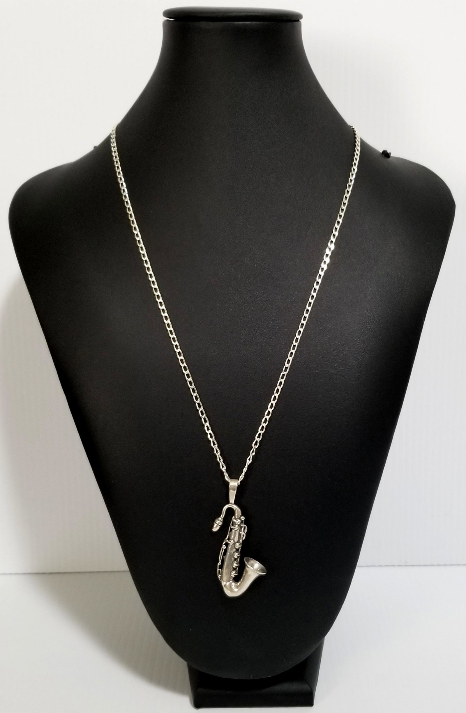 Amazing 925 Saxophone Pendant Necklace: Beautiful 925 sterlng silver saxophone pendant necklace, 23 inches long x 3 mm, 2 1/4 x 1 1/4 inches pendant, 24.9 grams