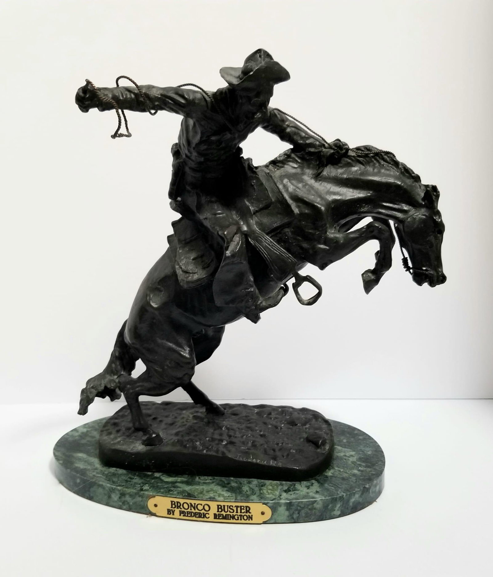 Amazing Frederic Remington Bronze Buster Sculpture: Nice Frederic Remington bronze buster sculpture, green marble base, 12 x 10 1/2 x 6 inches.