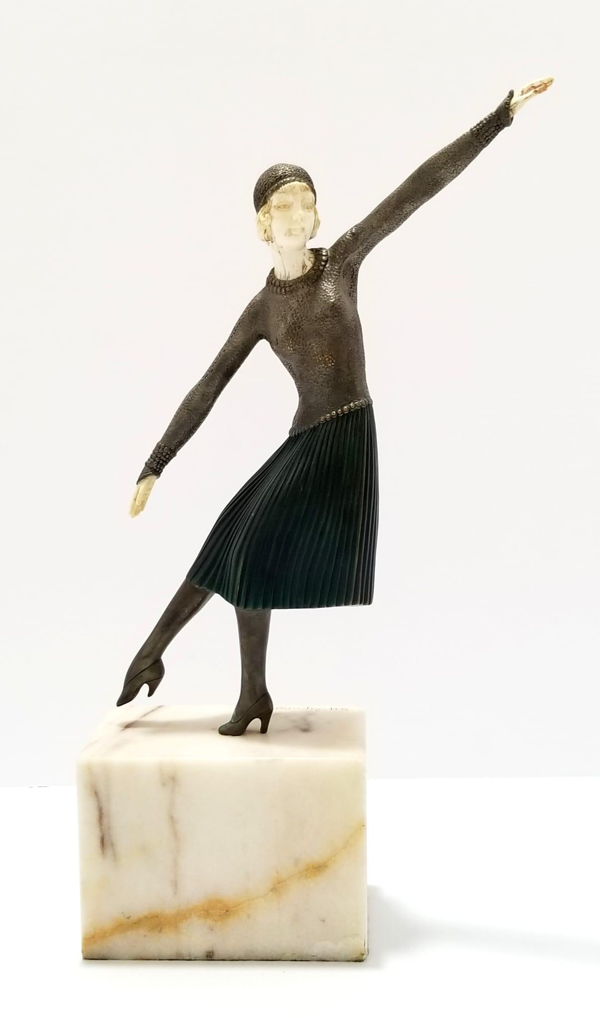 Amazing D.H. Chiparus Lady Dancer Sculpture Replica: Beautiful D.H. Chiparus, bronze, hand made, patina, lady dancer sculpture replica, marble base, bone on the face and hands, 16 1/2 x 10 x 3 1/2 inches.