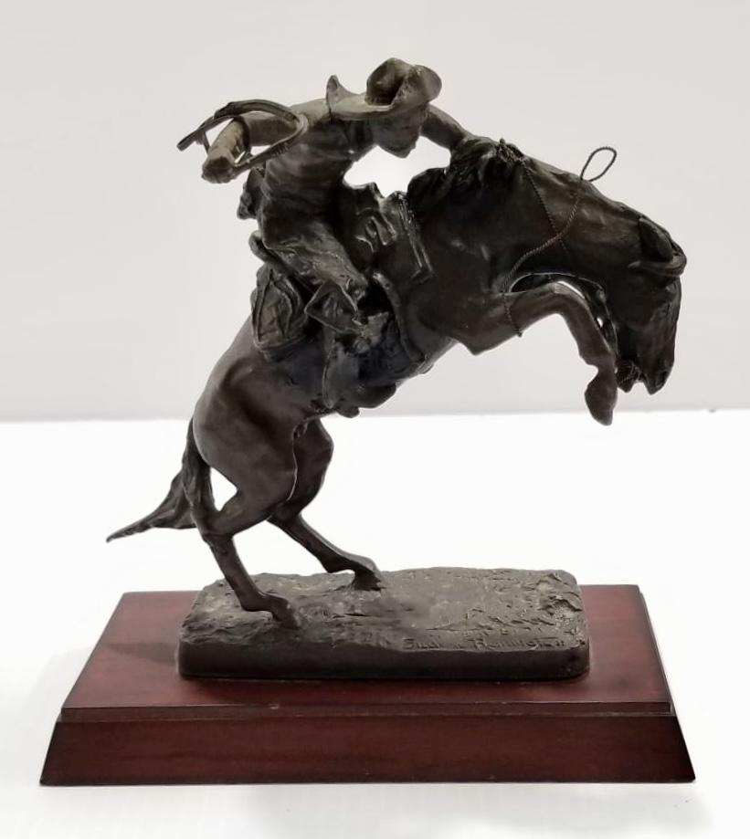 Amazing Frederic Remington Bronco Buster Bronze Sculpture: Nice Frederic Remington, the bronco buster bronze sculpture, copyright, wood base, 6 3/4 x 6 3/8 x 3 1/8 inches.