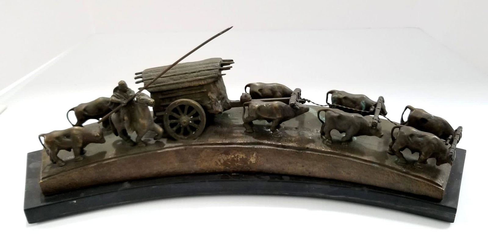 Amazing "La Carreta" After Jose Leoncio Belloni Bronze Sculpture: Amazing "La Carreta" after Jose Leoncio Belloni, bronze sculpture, black marble, excellent details, original patina, for condition please refer to photos for more details, 20 x 7 x 4 3/4 inches.