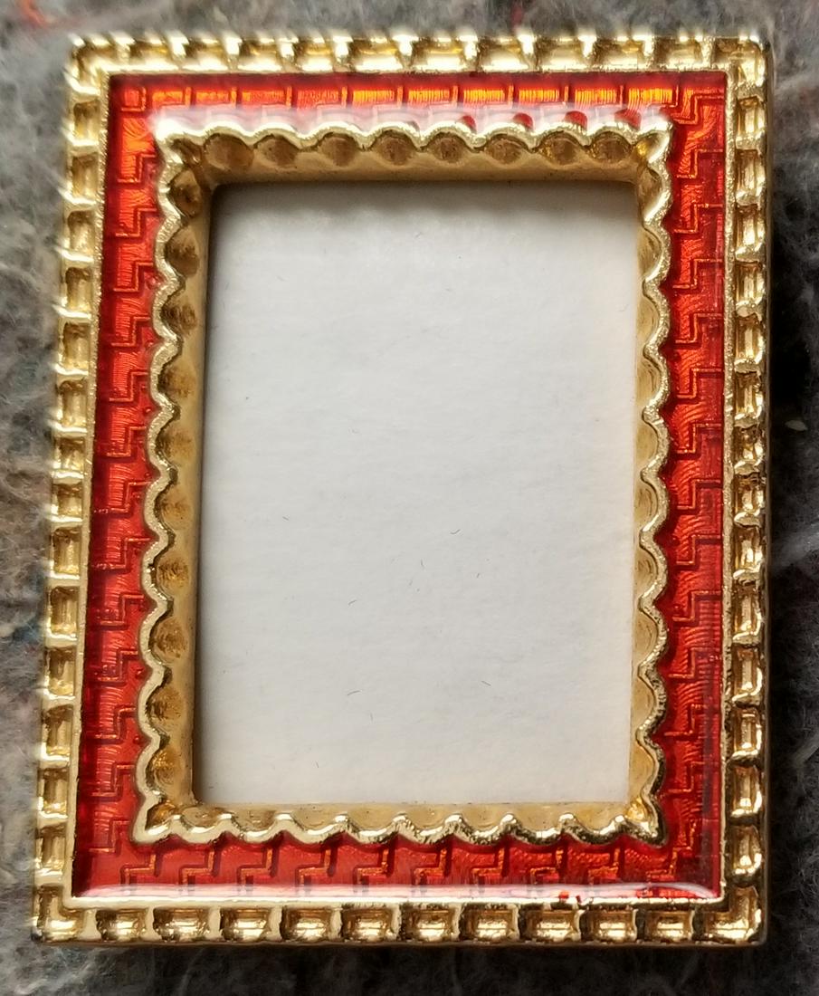 Amazing Red Enamel Golden Metal Frame: Beautiful red enamel golden metal frame, holds 2 x 1 1/2 inches, full size 2 7/8 x 2 1/8 inches