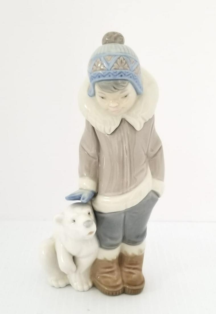 Amazing Lladro Child & Baby Polar Bear Figurine: Beautiful Lladro, child and baby polar bear porcelain figurine, 5 3/4 x 3 x 2 1/2 inches.