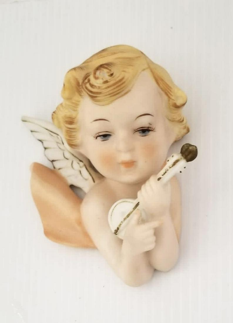 Amazing Napco Hand Painted Bisque Porcelain Angel: Beautiful Napco hand painted Bisque porcelain angel with guitar, 4 3/4 x 4 inches.