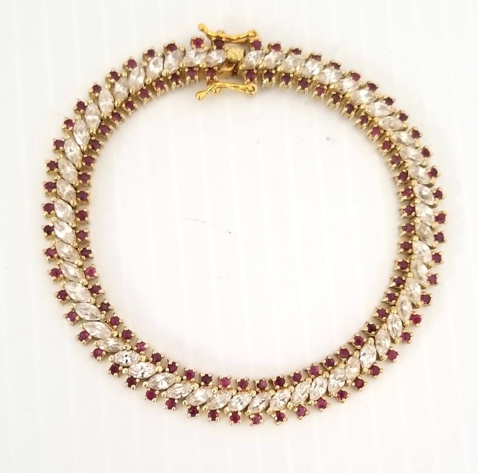 Amazing CL 925 Gold Tone Red & Clear ZC Bracelet: Beautiful CL 925 sterling gold tone, red and clear Zirconia bracelet, 7 1/2 inches x 9 mm, 19.5 grams.