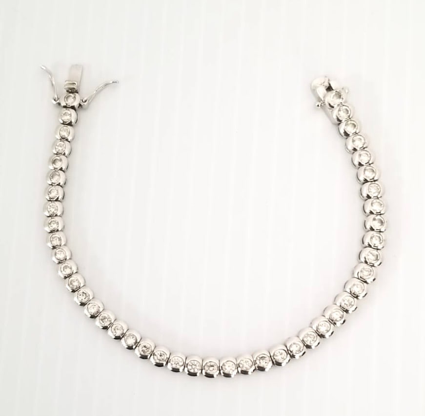 Amazing FAS Faceted Clear Zirconia 925 Sterling Bracelet: Nice 925 sterling silver, FAS faceted clear Zirconia bracelet, 7 inches x 5 mm, 15.4 grams.