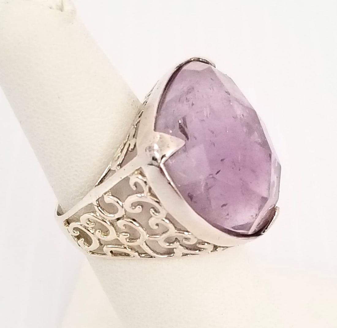 Amazing GSJ 925 Sterling Amethyst Quartz Ring: Beautiful GSJ 925 sterliing silver, 18ct cut Amethyst, quartz ring, 11 grams, size 6.