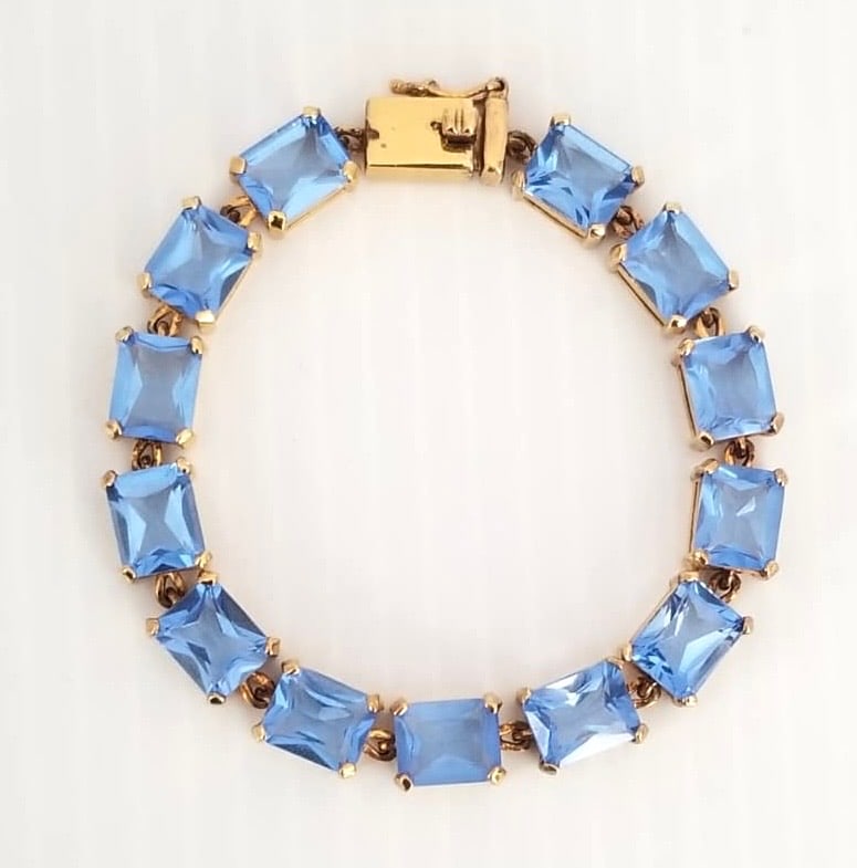 Amazing ITC 925 Sterling Gold Tone Blue Cut ZC Bracelet: Beautiful ITC 925 sterling gold tone blue cut Zirconia bracelet, 7 inches x 9 mm, 27.6 grams.