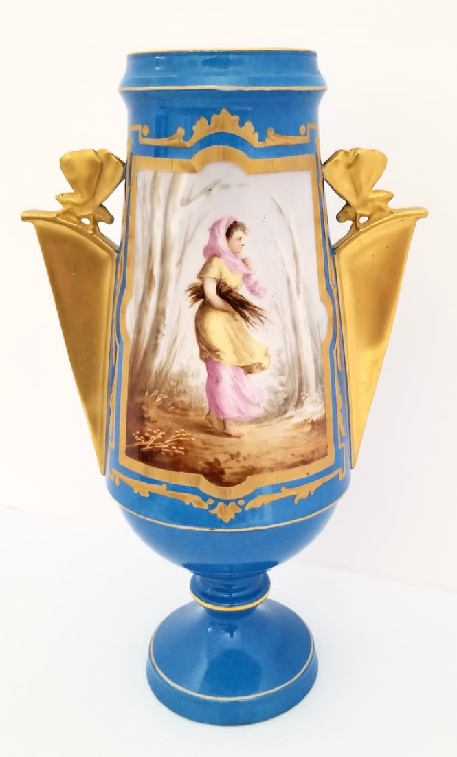 Amazing Sevres Polychrome Porcelain Vase: Beautiful Sevres Polychrome porcelain vase, decorated flowers and lady, 24kt gold color, beautiful lady, insects in the handles, stamped blue Sevres. 11 x 5.5 x 4 inches.