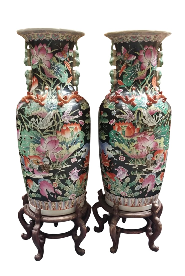 Amazing Chinese Family Noire Porcelain Vase Pair: Beautiful large Chinese family Noire porcelain vase pair, hand painted, relief flowers and dragons, painted rooster, fish, insects, with original wood bases, no breakage or repairs. 47 x 14 x 14