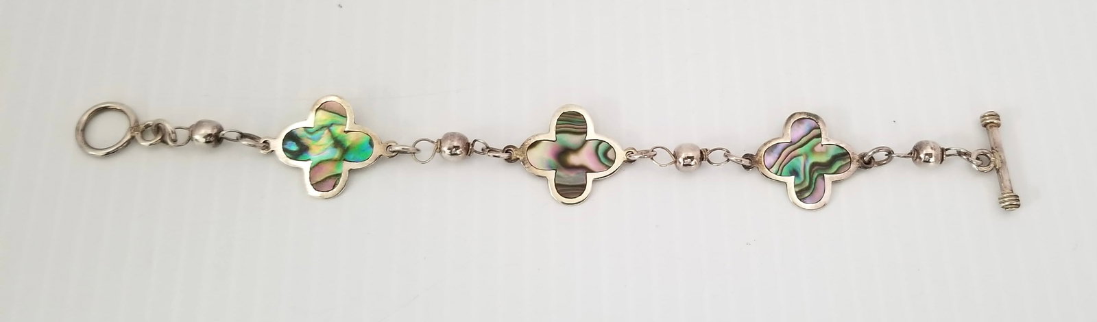 Amazing 925 Sterling Silver Abalone Shell Clover Bracelet: Beautiful 925 sterling silver Abalone shell clover bracelet, 7 1/2 x 3/4 inches, 10.7 grams.