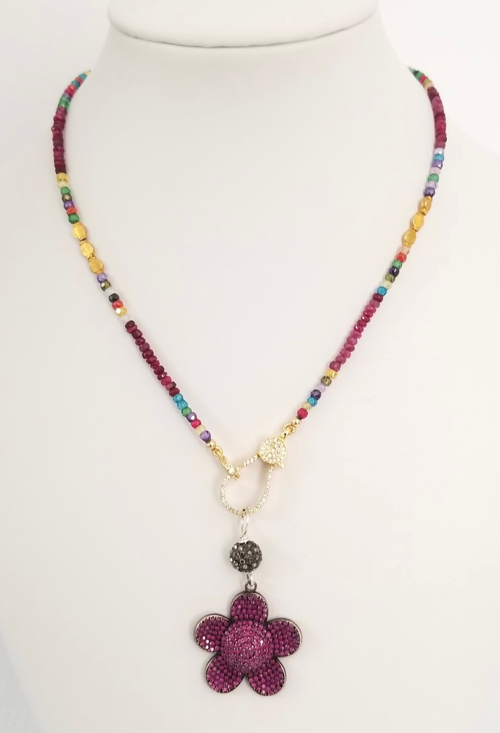 Amazing Cut Amethyst Cut Bead Stone Flower Pendant Necklace: Beautiful cut Amethyst cut beads stones(1 to 3 mm) flower pendant 1 1/2 x 1 1/8 inches, necklace 16 inches long.