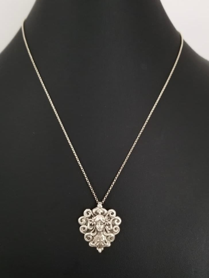Amazing Sterling Silver Lady Face Pendant Necklace: Beautiful sterling silver lady face art noveau pendant necklace, pendant 1 1/8 x 1 inch, necklace 17 inches x 1 mm, 7.6 grams.