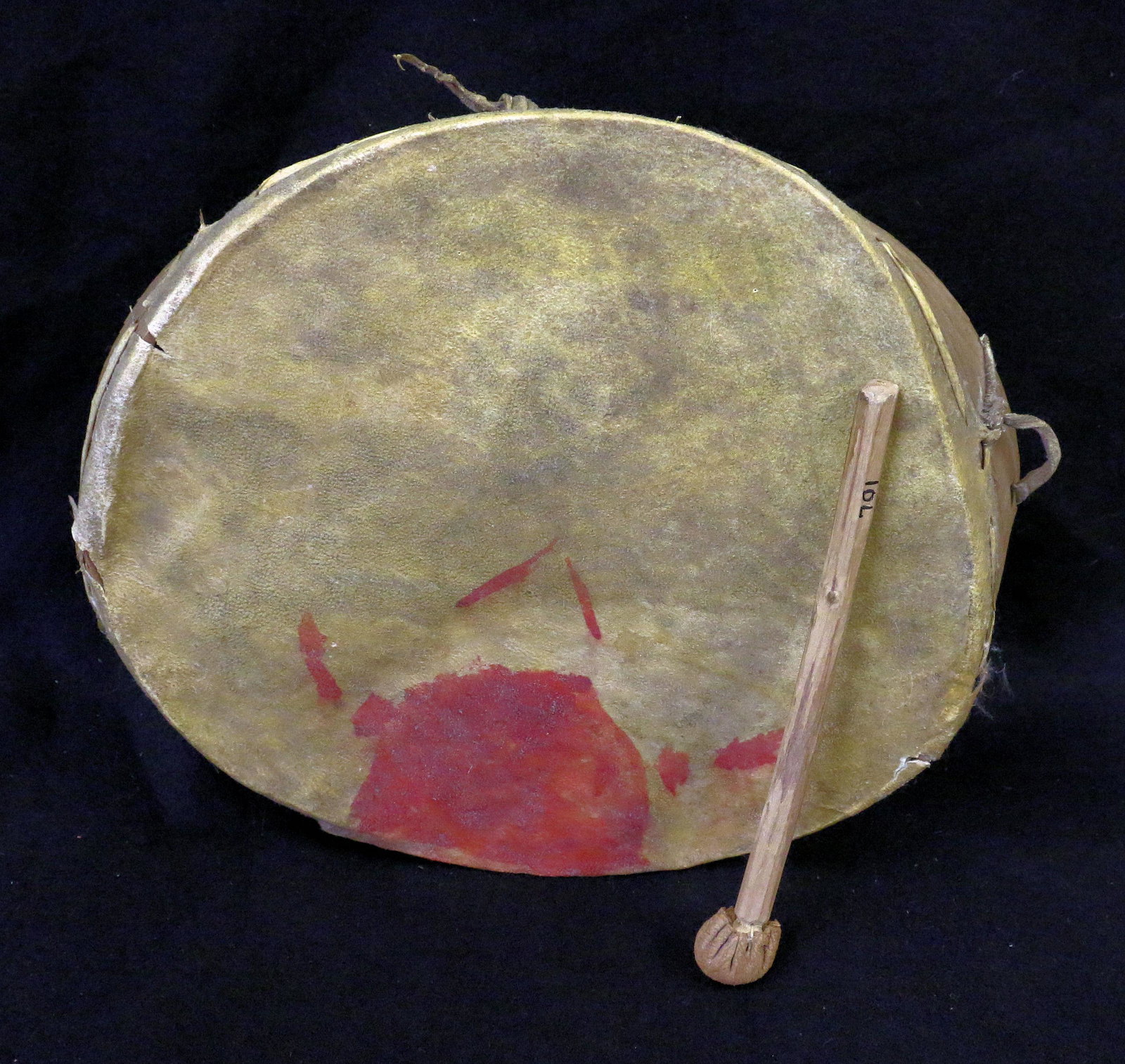Early Plains Drum & Drumstick: Early Plains Drum and drumstick with red decoration, 10" dia., sinew-sewn.