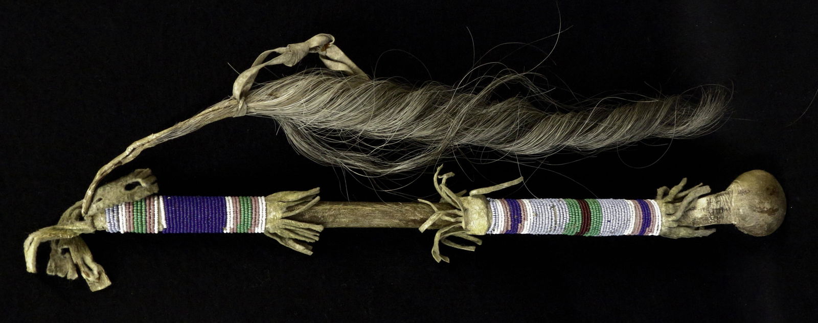 Plains Indian Club with Drop: Plains Indian Club, hide covered stone with twisted horse-hair drop, 18" long, sinew-sewn.