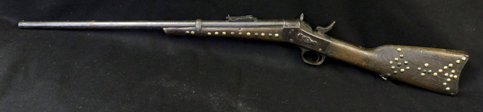 Rolling Block Indian Rifle w/tacks decoration: Rolling Block Indian Rifle w/tacks decoration, 41" long.