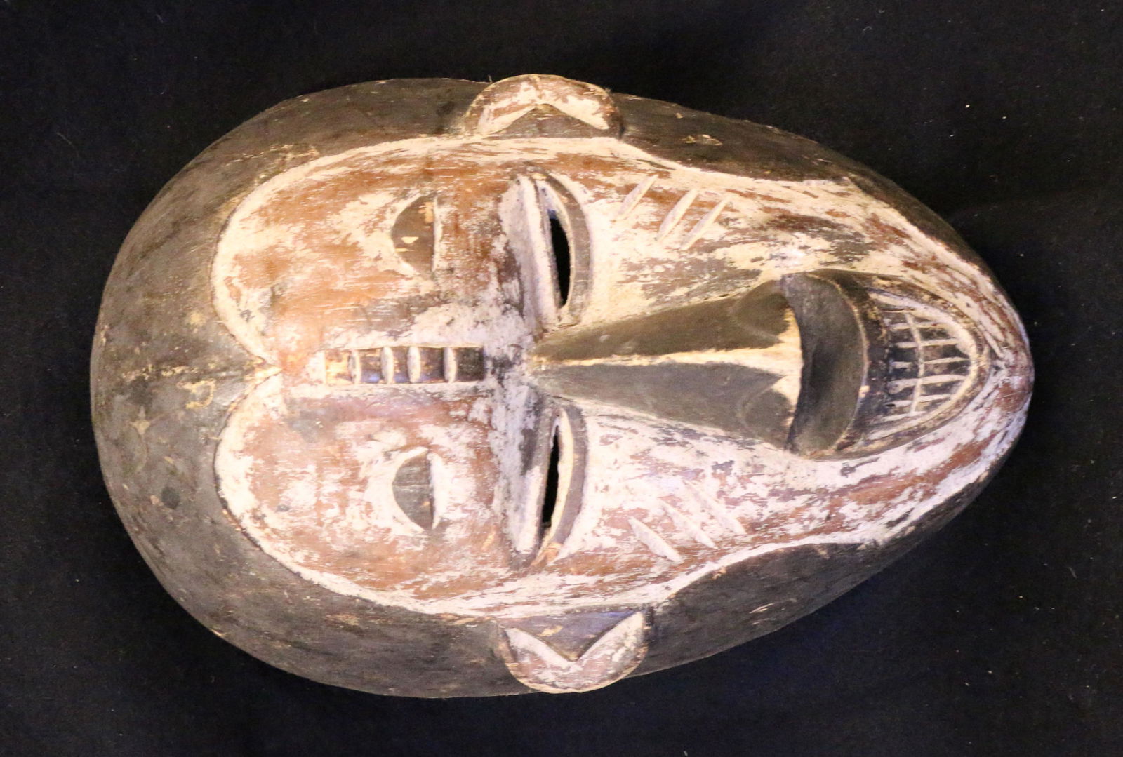 African Wooden Mask: African Wooden Mask - 11" long.