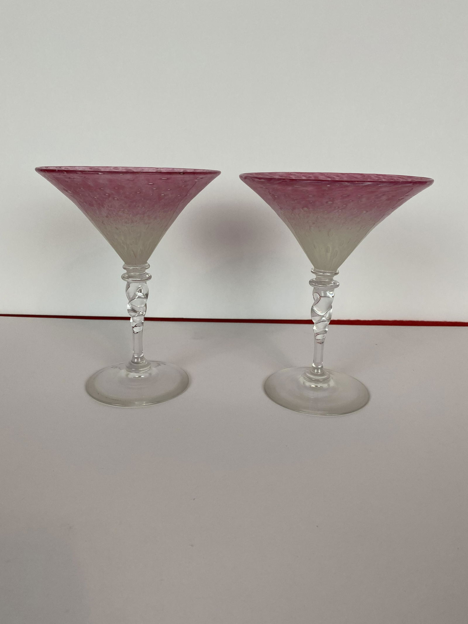 Extremely Rare Steuben Cluthra Champagne Glasses - 2/12: Extremely Rare Steuben Cluthra Champagne Glasses - 2 of 12 produced , 5.5" tall and 4.25" dia. at rim, extremely rare for the Art Glass Collector, Excellent condition.