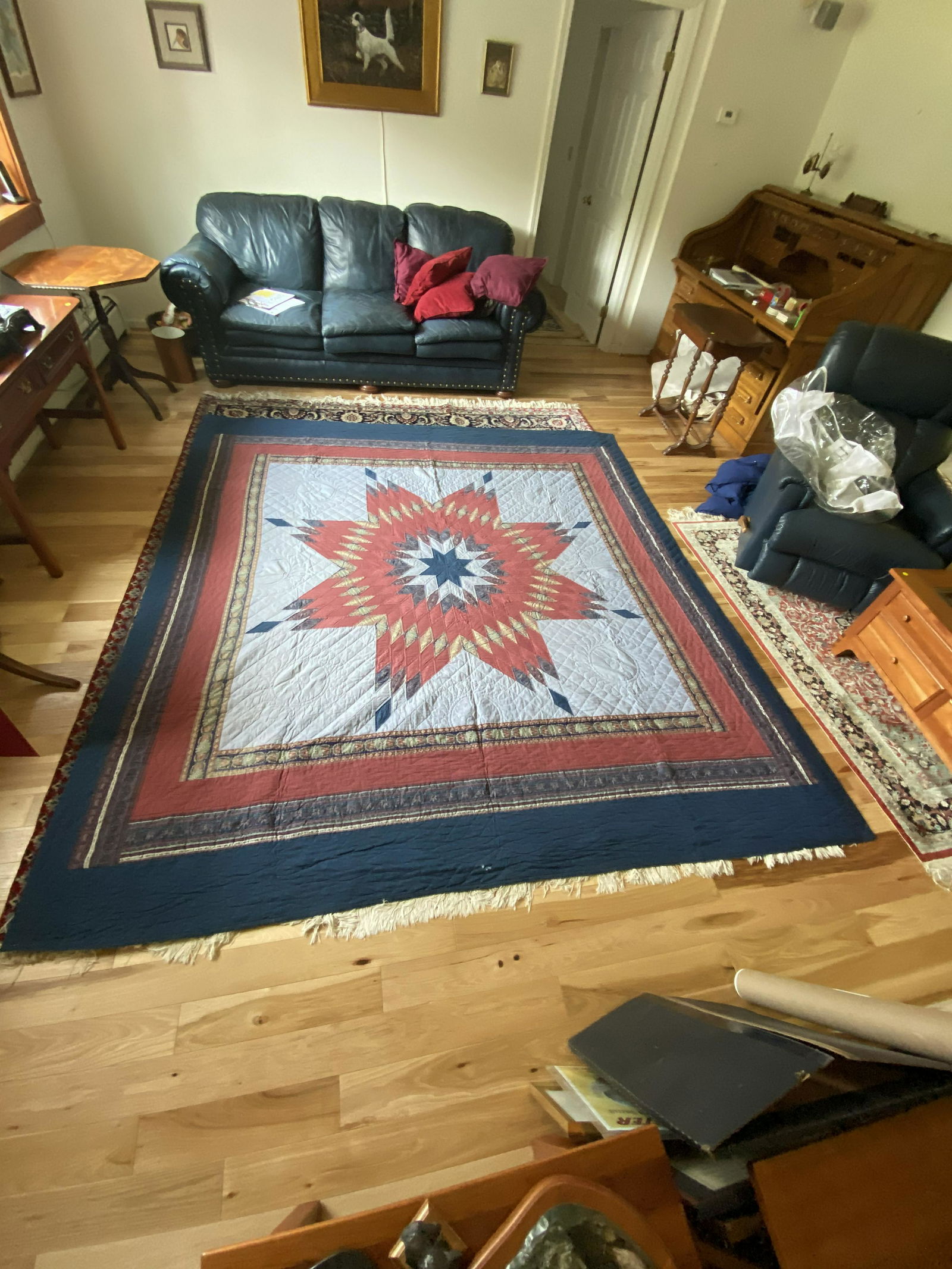 Quilt: Amish Handstitched Quilt by Mona Zellenka: Quilt: Amish Handstitched Quilt by Mona Zellenka of Especially For You, modern pieced quilt 8 pointed star central pattern on a slate blue/gray field with blue and rust border piece work, 9'-3"x8'-4",