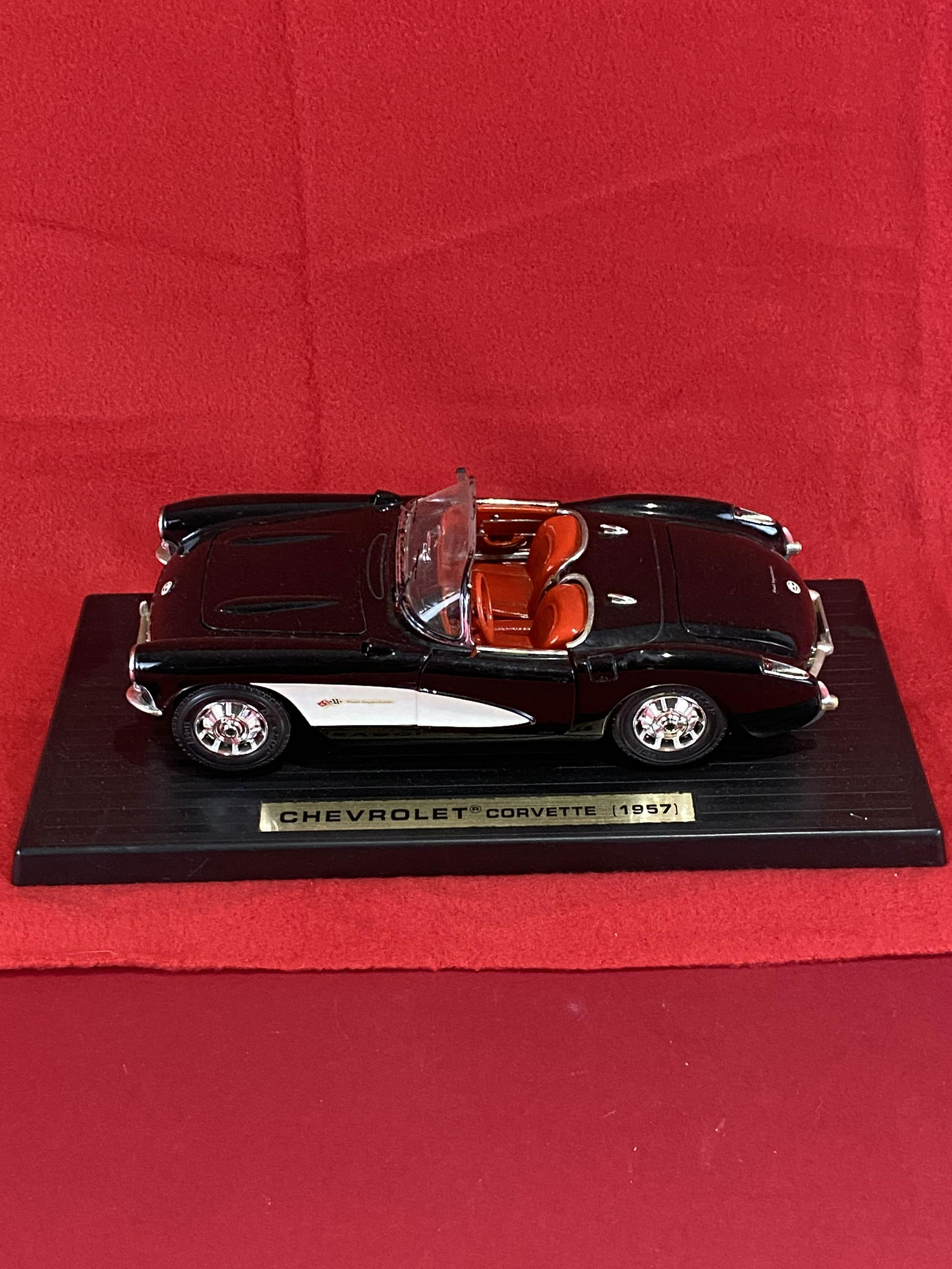 Model Car: 1957 Chevrolet Corvette: Model Car: 1957 Chevrolet Corvette, black with silver cove and red interior on base.