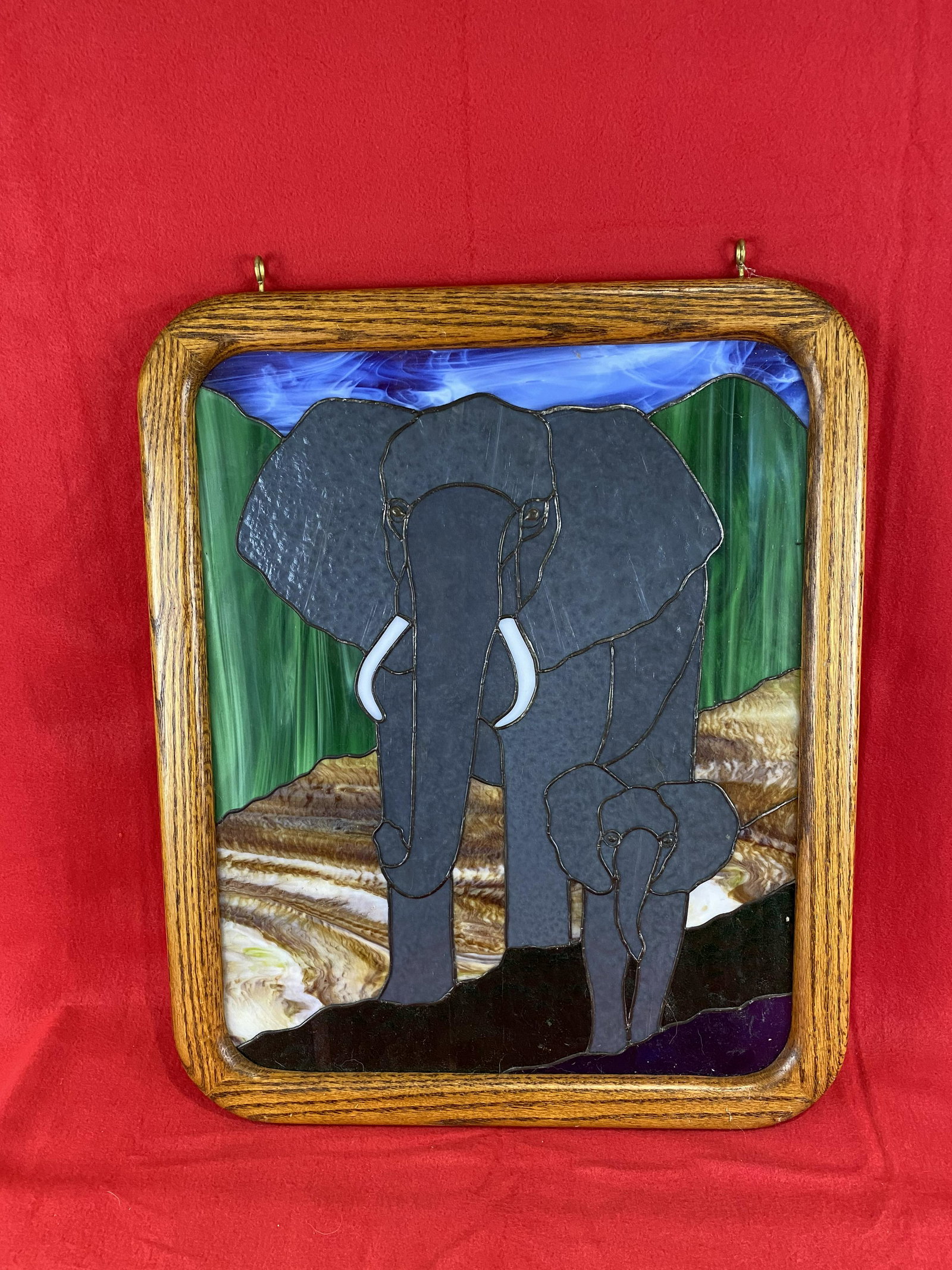 Modern Stain glass Decorative Panel of Elephants: Modern Stain glass Decorative Panel of Elephants in oak frame, 22.5" h x 18" w, excellent condition.