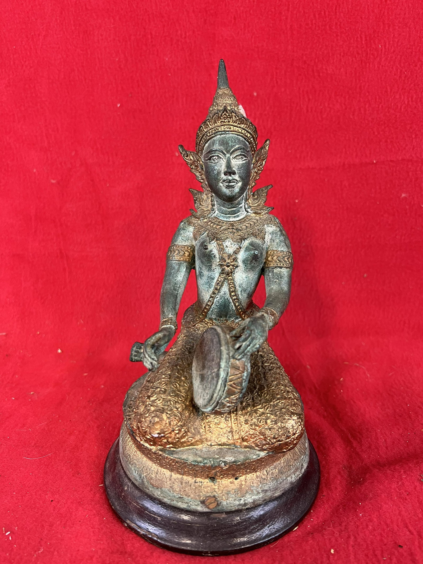 Vintage Hindu / Indian Bronze Sculpture of a Goddess: Vintage Hindu / Indian Bronze Sculpture of a Goddess playing a musical instrument. The sculpture measures approximately 9 1/2" tall. Condition - is as shown.