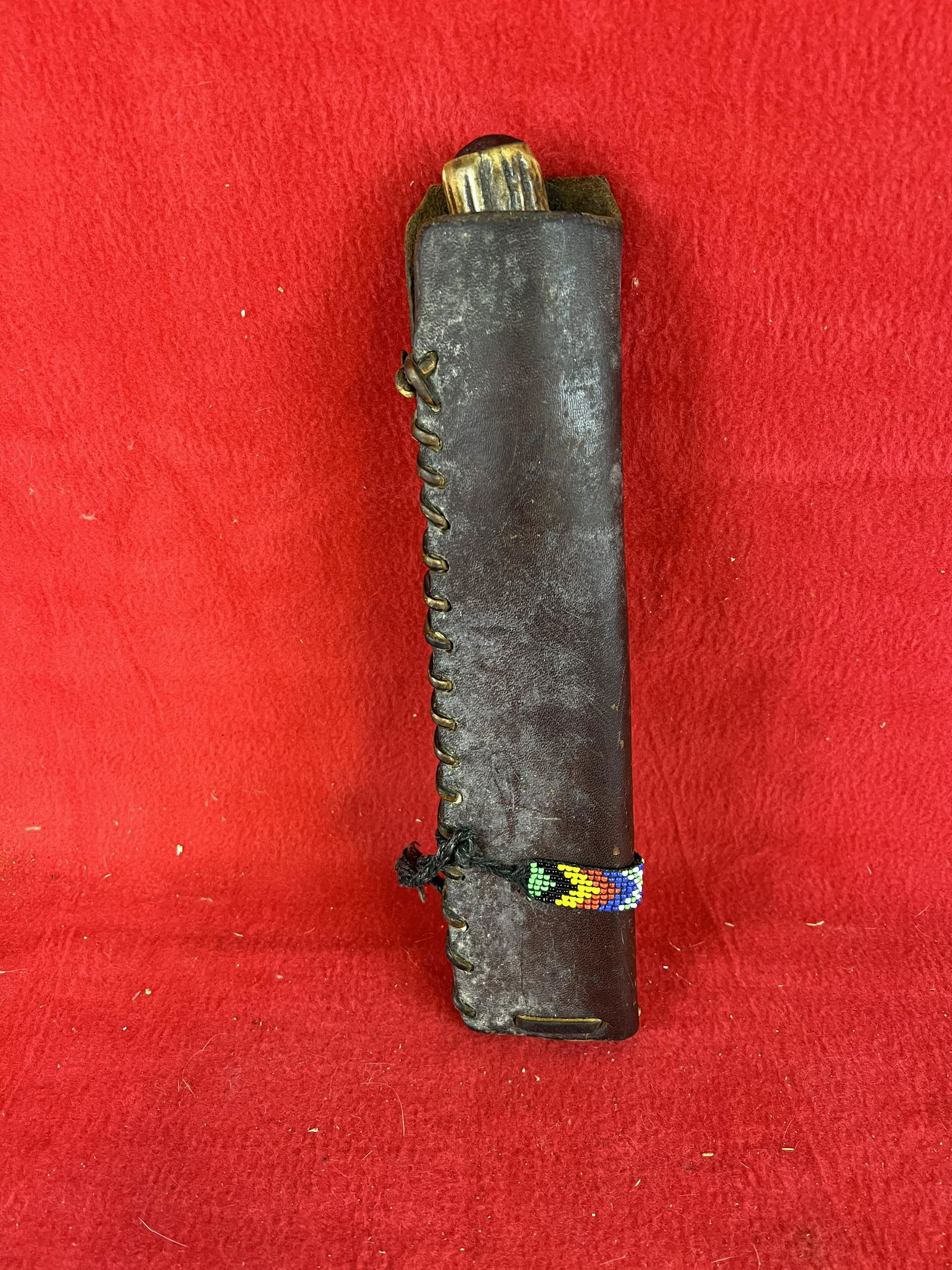 Antique Stag Antler Handled Native American Indian: Antique Stag Antler Handled Native American Indian Skinning Knife in a leather sheath. The knife itself measures approximately 10 3/4" long. Condition - blade is well worn with old patina and one side