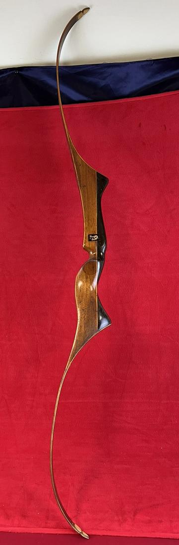 Black Hawk Recurve Bow: Black Hawk Recurve Bow which measures approximately 59 1/2" from tip to tip and is in generally nice condition with just some minor use wear.
