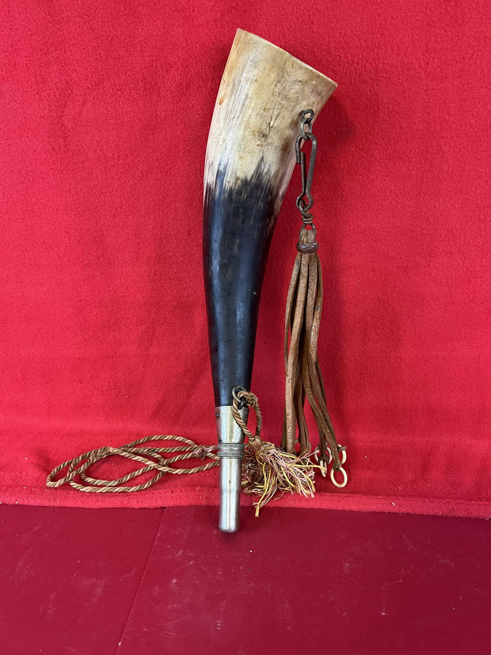 Vintage Game Calling Horn: A Large Nickel Plated Brass Mounted Cow Horn Calling Horn Which Measures Approximately 13 1/2" Long. Horn Has Leather Attachments With Bone Rings. Condition - Fine As Shown.