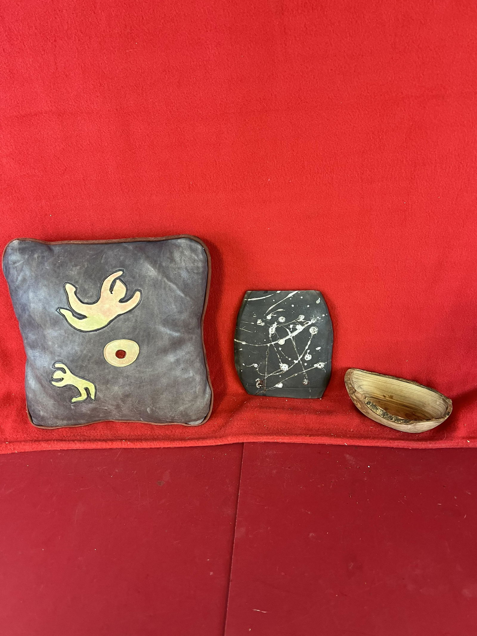 Lot Of Three Native American Related Items: A Lot Of Three Native American Related items To Include A Leather Pillow (10" By 10") a Small Free Edge Wooden Bowl and A Pottery Tile With Silver White Glaze Spatters.