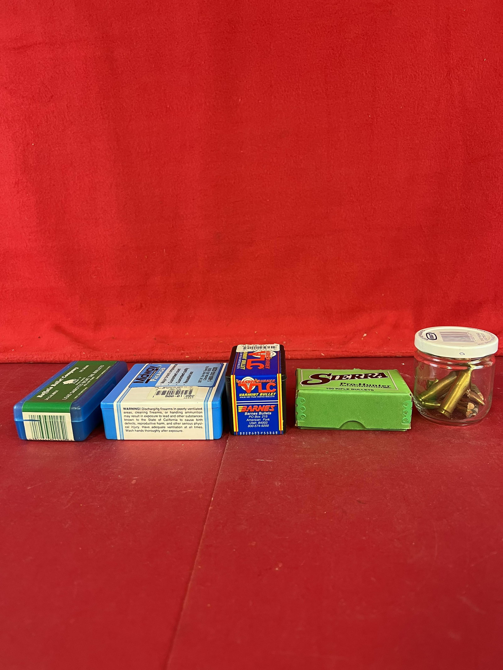 Lot Reloading Bullets By Various Makers: A lot of reloading bullets of various calibers by Sierra; Barnes; Buffalo Bullet Co and Midway all but the Sierra and full and unopened. The Sierra is open but appears to be complete or very near so.