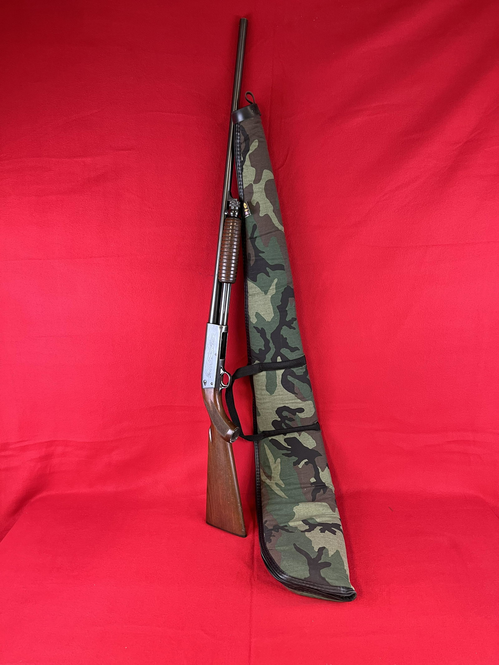 Ithaca Model 37 Featherlight 16 ga Shotgun: Ithaca Model 37 Featherweight 16 ga Pump Shotgun, 2.75" , 27 1/2" modified barrel. Serial Number 1849982. Comes With Camo Soft Case. Condition - Very Nice With Minor Normal Use Wear.