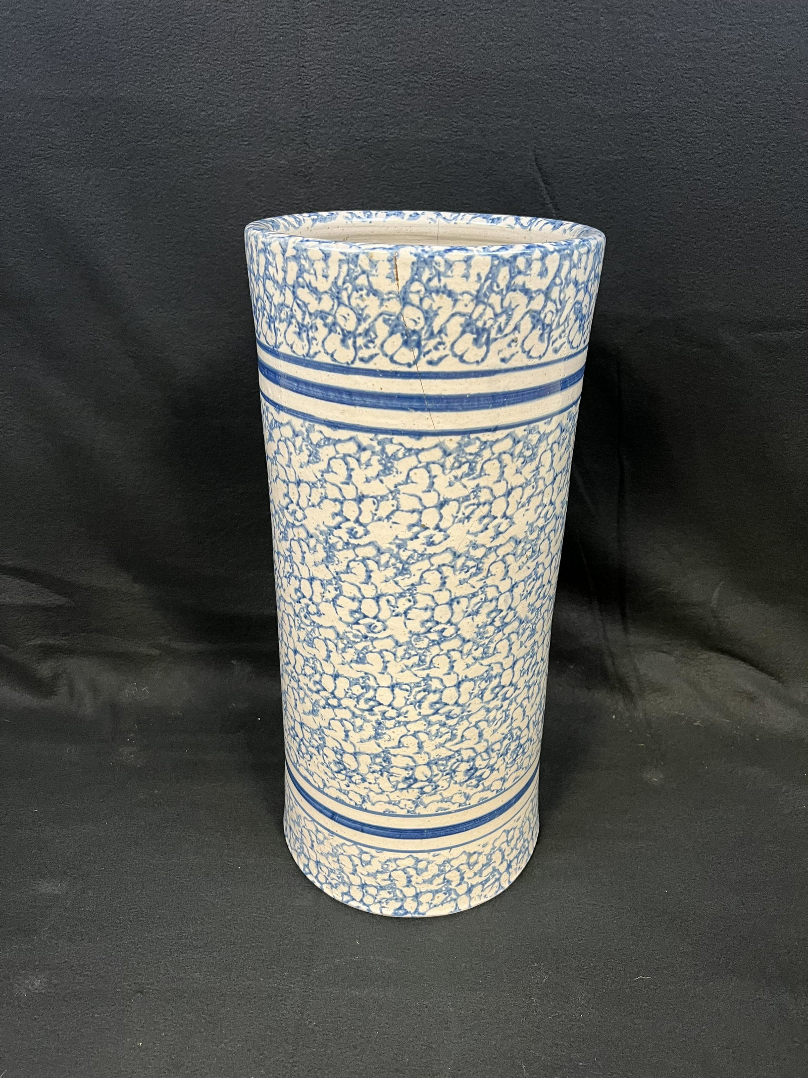 Antique Spongeware Umbrella Stand: Antique Spongeware Umbrella Stand, approx. 20.5" tall. Condition - two old tight hairlines approximately 12" running down from rim otherwise fine.