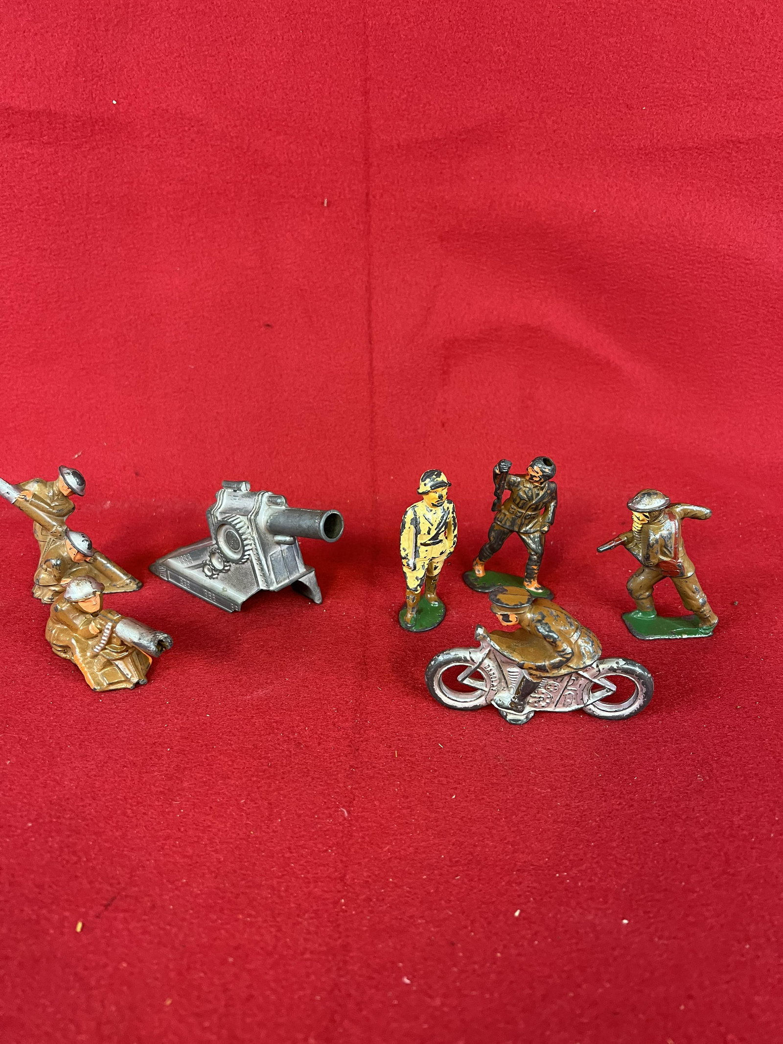Lot WW1 Barclay Toy Soldiers: A lot of World War One Barclay diecast toy soldiers including one motorcycle rider. Condition - as shown with some wear to their original factory paint.