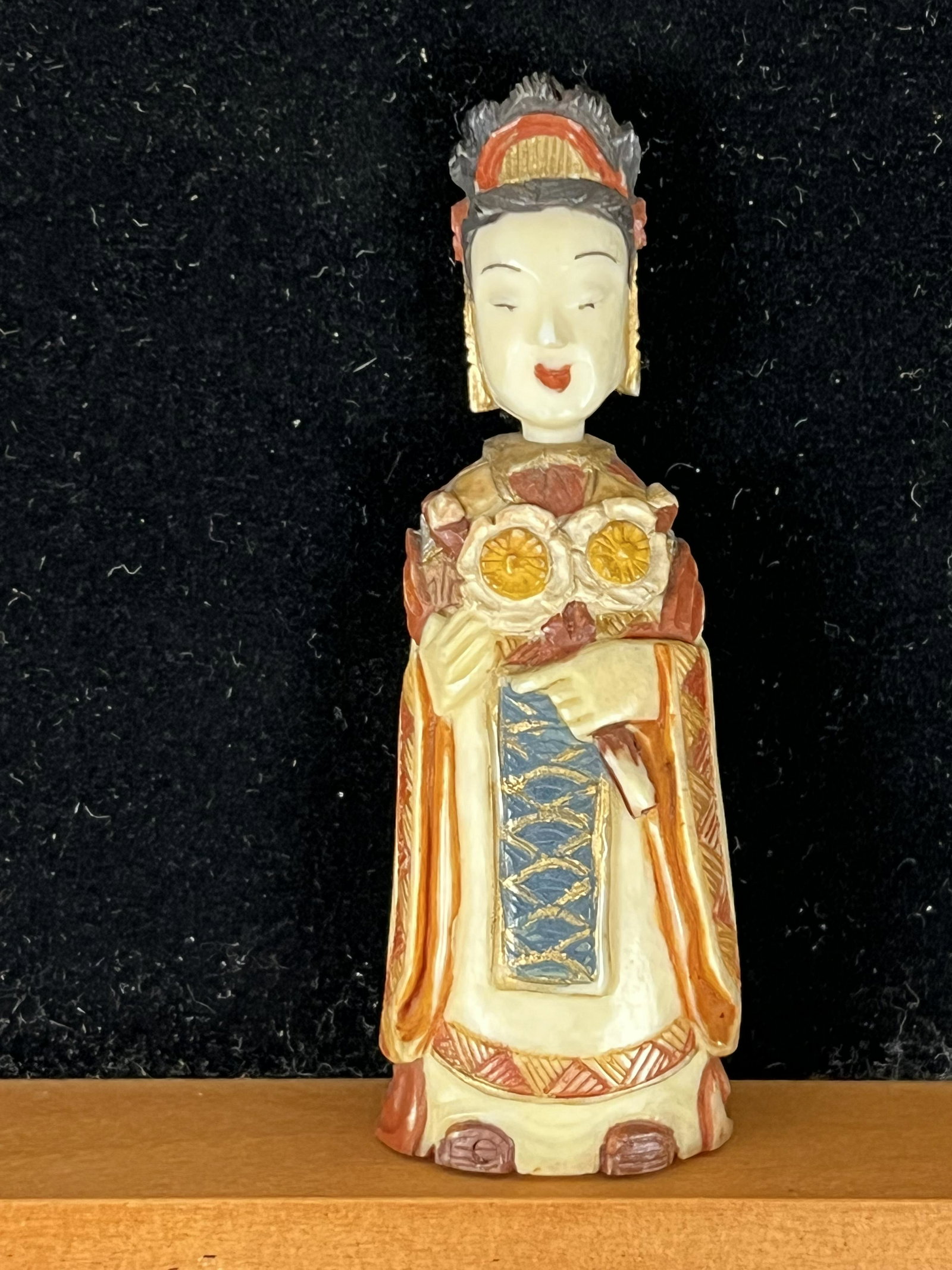 Antique Figural Chinese Snuff Bottle: Antique Chinese polychrome decorated hand carved bone snuff bottle in the form of a woman which stands approximately 3" tall and is in excellent condition.