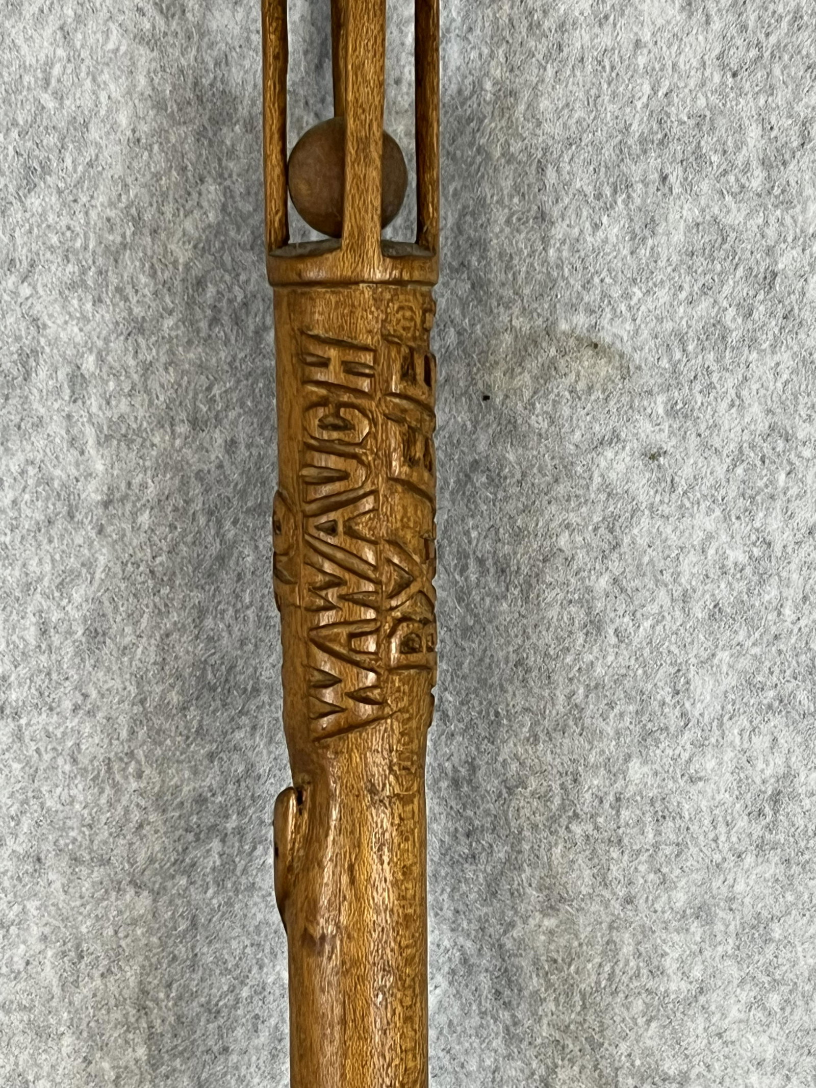 1932 Folk Art Hand Carved Presentation Cane: Dated 1932 hand carved wooden folk art cane with snake on shaft and having an entrapped ball at top. Cane has a presentation inscription on shaft "Presented To W. Waugh By E. E. Strickland Aug 21 1932