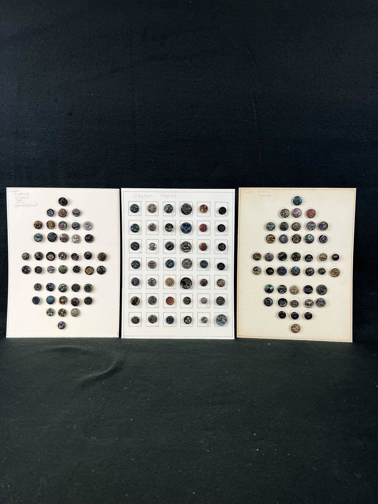 Lot 3 Cards Antique 19th Century Black Glass Lustre Buttons To Include Pictorials, Animals, Florals: A lot of three cards of antique 19th century black glass lustre buttons to include those depicting birds, florals, animals etc.