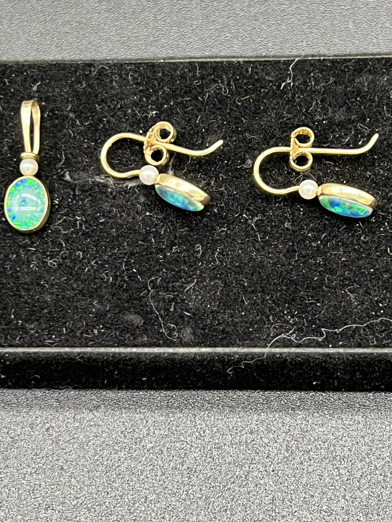 Ed Levin 14K Gold Pendant And Matching Earrings Set With A Opal And Small Pearl: A signed Ed Levin 14K gold pendant and matching earrings set with a small pearl and a opal which has a weight of 1.7 dwts. Condition - fine.
