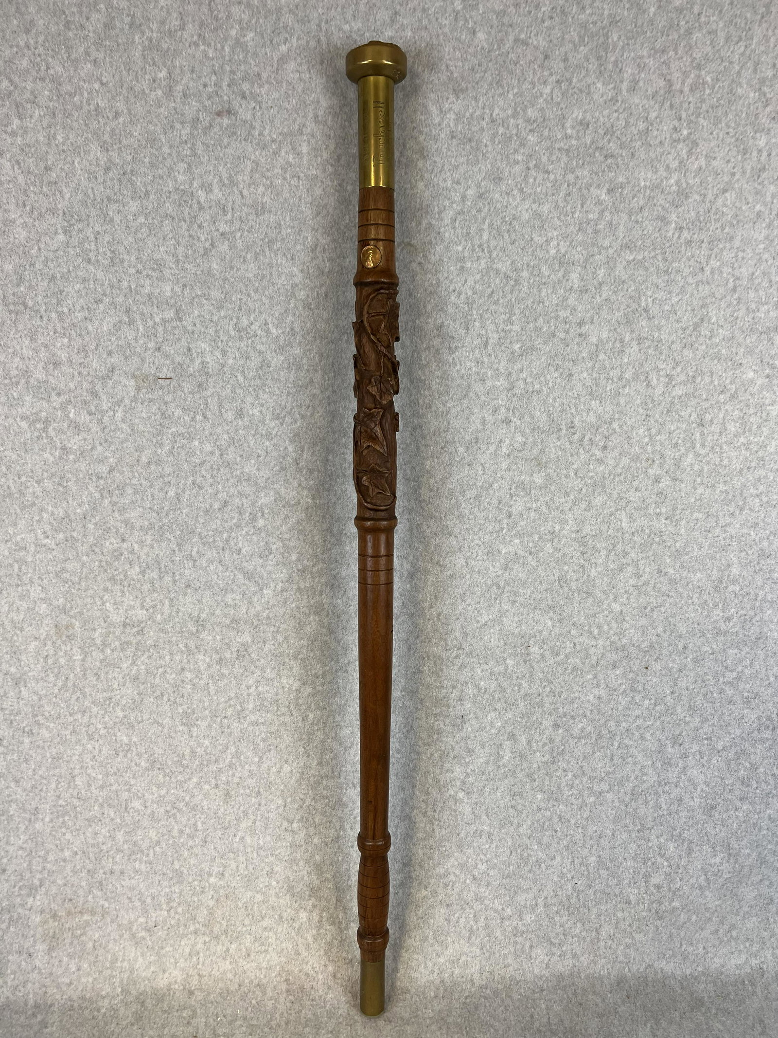 Unusual Norman Rockwell " Friend Of Man" Cane / E Gardner 1968: A very unusual vintage cane with a heavy brass top / handle which is engraved on the underside E Gardner 1968 and then below this on the brass NORMAN ROCKWELL "Friend Of Man" with a deeply engraved wo