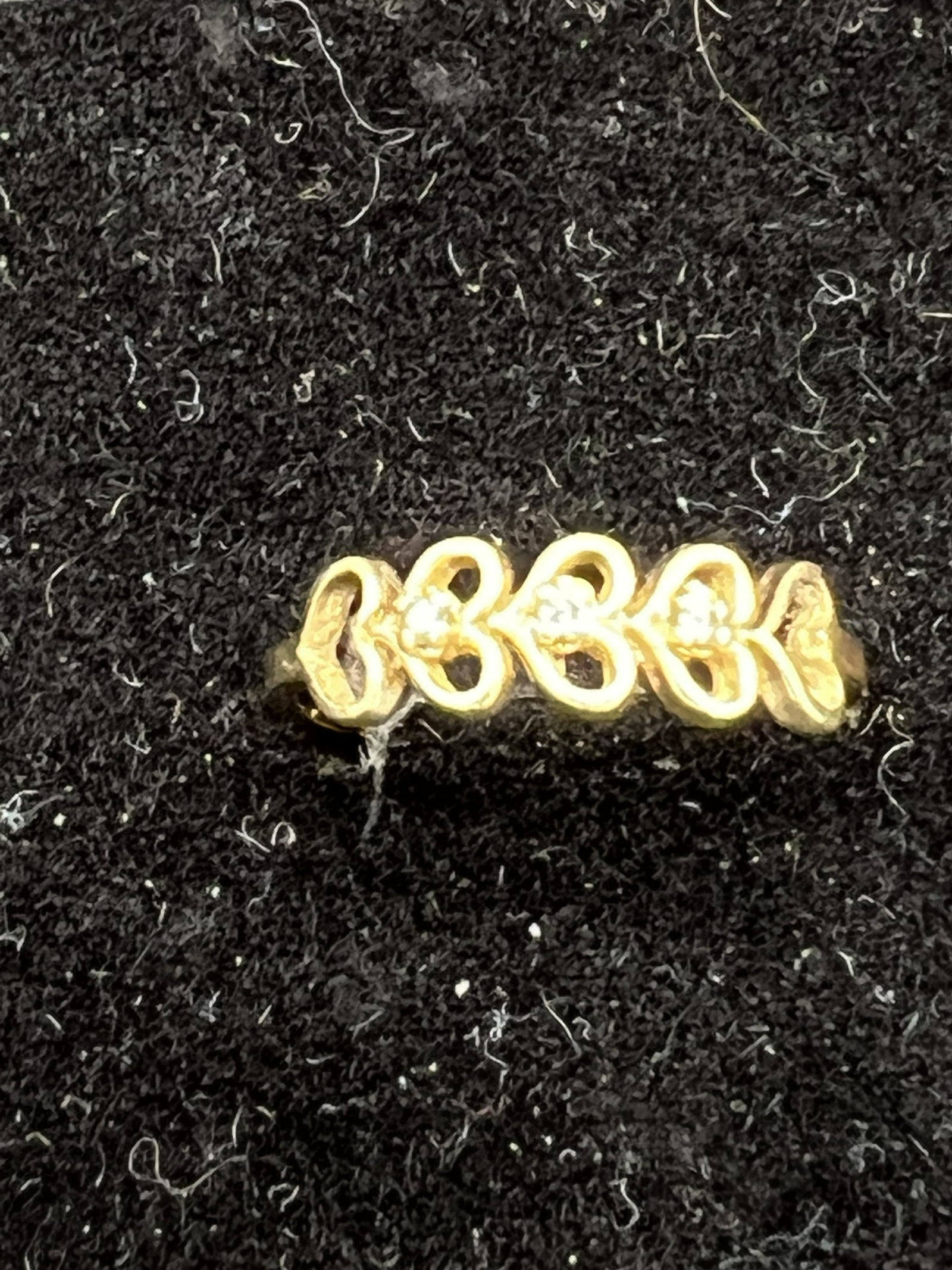 10K Gold Ring Set With Small Diamonds: 10K gold ring set with small diamonds which has a weight of 1.1 dwts. Size 6.75. Condition - fine.